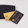 Credit card Black and gold color in black on wallet isolated on white background.